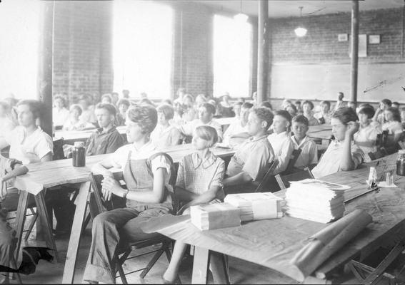 Students sitting in a large room
