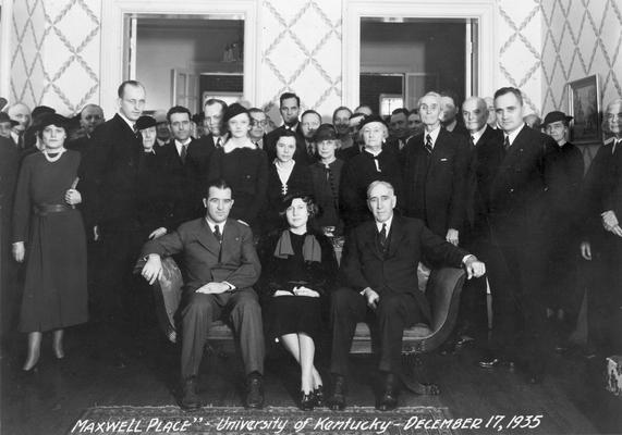 Group at Maxwell Place seated on couch from left to right, Governor A. B. 