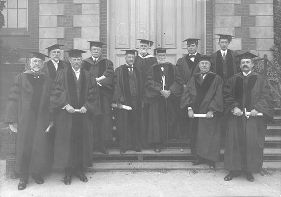 Board of Trustees, President Barker, third from left, James G. White, last row, white beard, President Emeritus Patterson, center with cane, Claude Terrell, last row, right of Patterson, Richard Stoll, last row, right of Terrell, Unidentified individual, circa 1917