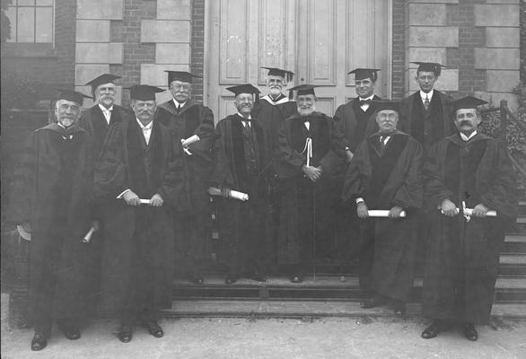 Board of Trustees, President Barker, third from left, James G. White, last row, white beard, President Emeritus Patterson, center with cane, Claude Terrell, last row, right of Patterson, Richard Stoll, last row, right of Terrell, Unidentified individual, circa 1917