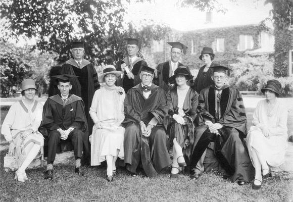 Graduation, President Frank McVey in center with glasses, circa 1920's