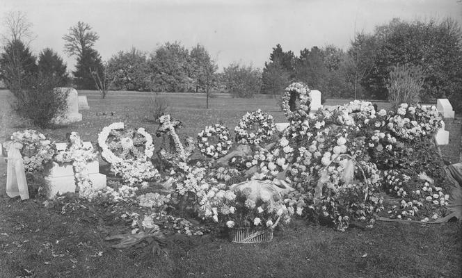 Floral wreaths surrounding a monument