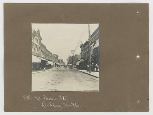 *8th and Bourbon Sts Looking North; handwritten on back of photographic mounting