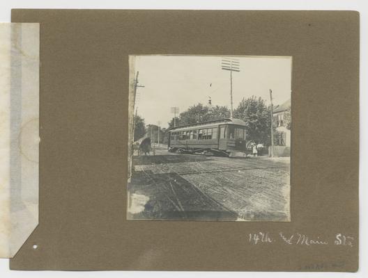 14th and Main Sts; handwritten on front of photographic mounting