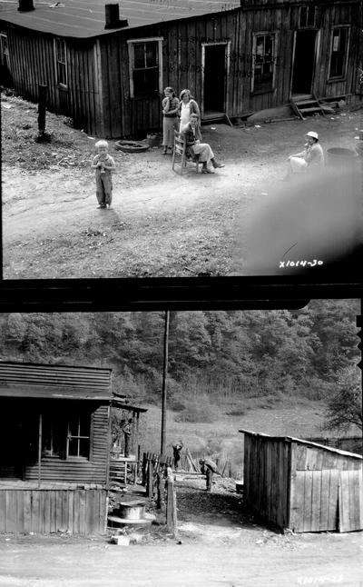 Family in front of shack on dirt road; Three persons outside of a shack in the mountains