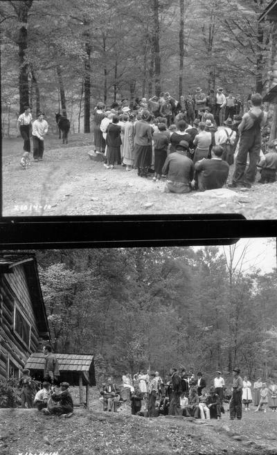 People crowded around log cabin; Musicians and crowd watching John Jacob Niles playing for CBS broadcast