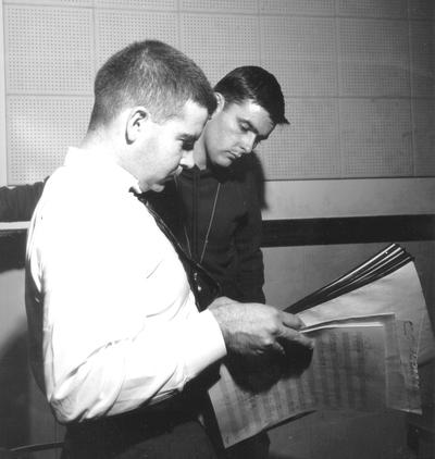 Two men looking over sheet music (Ronald Russell-Tutty)