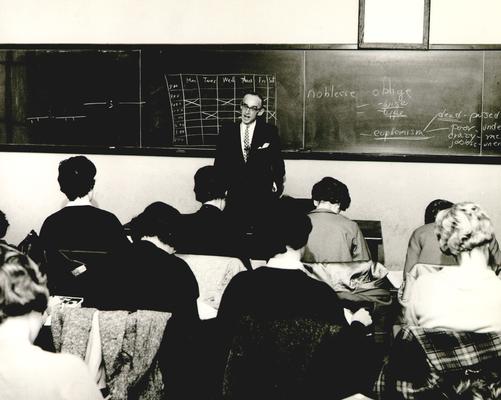 English Professor Dr. Arthur L. Cooke speaking to students
