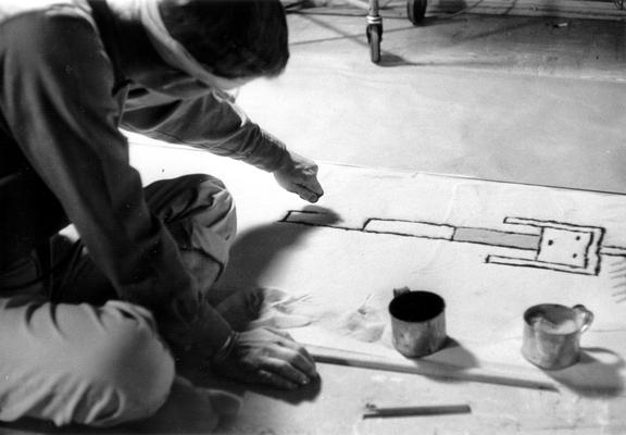 Dr. Doug Schwartz recreating Southwestern Art on the floor of a television studio