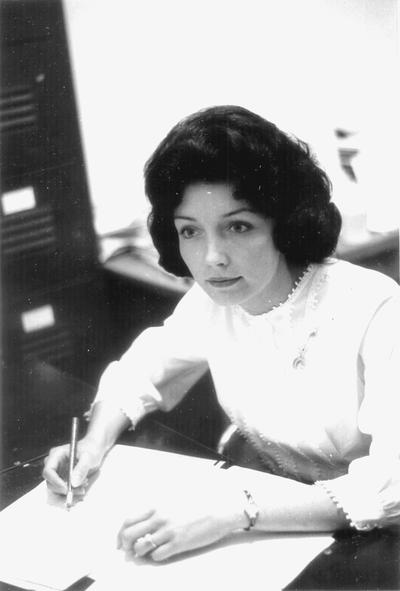 Photo of woman working at desk