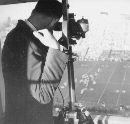 Ric Sanderson filming a football game at Stoll Field