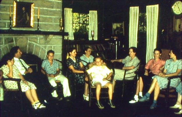 Group of people sitting in a living room