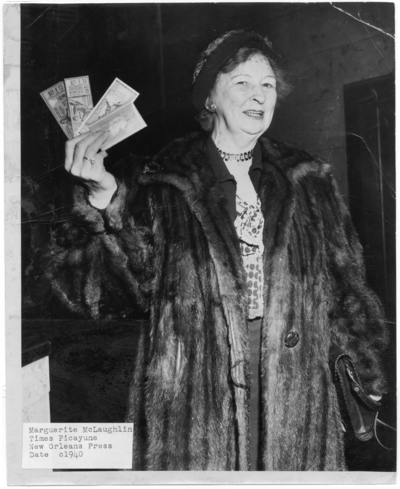 McLaughlin holding basketball tickets for UK's loss to Indiana in New Orleans' Sugar Bowl. Image credited to the Times Picayune, 1940 December 30