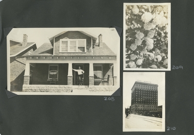 exterior of house with a man standing on the porch ; flowers; 