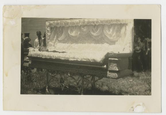 View of open casket with body of Jesse Eubank inside