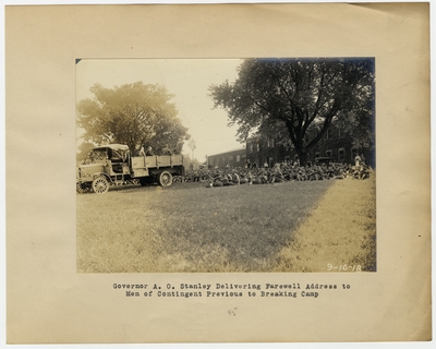 Governor A. O. Stanley delivering farewell address to men of Contingent previous to breaking camp