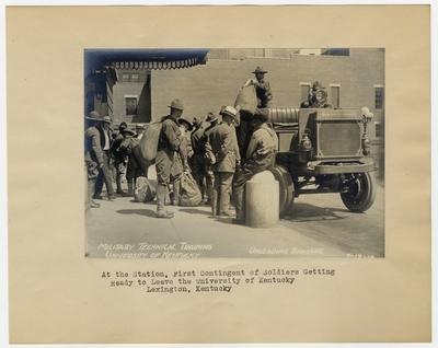 At the station, First Contingent of Soldiers getting ready to leave the University of Kentucky and unloading baggage. Lexington, KY