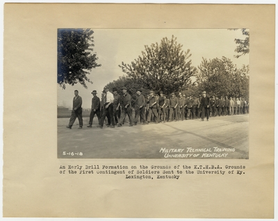 An early drill formation on the grounds of the K.T.H.B.A. grounds of the First Contingent of Soldiers sent to the University of Kentucky. Lexington, KY