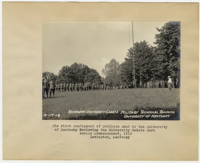 The First Contingent of Soldiers sent to the University of Kentucky reviewing the University Cadets just before commencement, 1918. Lexington, KY