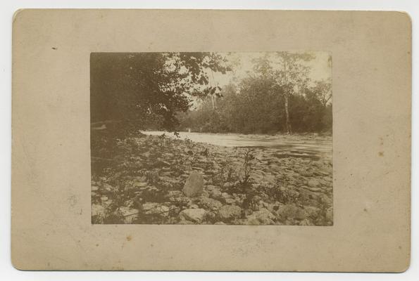 Rocky bank of Elkhorn Creek; View on Elkhorn taken by Paul, 1886 written in ink on back