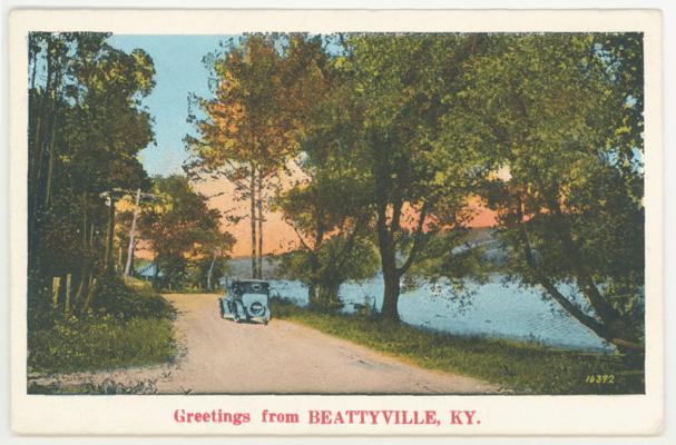 Greetings from Beattyville, Ky. [Generic car on lake road scene] (Hand written date - 1930.)