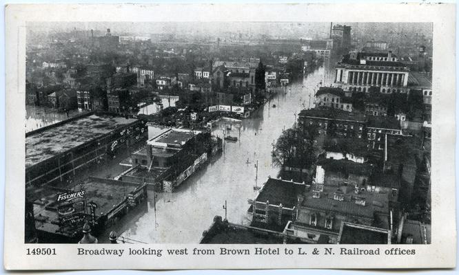 Souvenir Post Cards, Louisville Flood Scenes, January, 1937. Broadway looking west from Brown Hotel to L. & N. Railroad offices