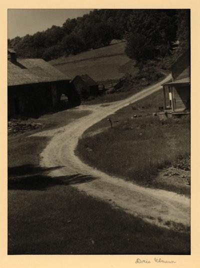 Unidentified Landscape.  From Dr. McVey's Files. January 1953.  Dirt road, winding between house and barn