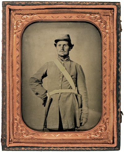 Confederate soldier, 1st Lieutenant uniform; inside the case, written in ink: 