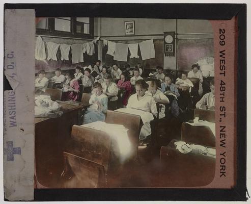 Students in classroom; American Red Cross slide; 209 W. 48th Street NY, NY printed on edge