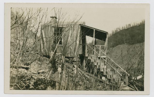 Caney Creek, Kentucky- Nurse shelter on Caney Creek. One room and lean-to. This is the upper tier of steps as the shleter is built on the mountain to avoid floods in the valley