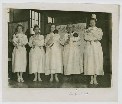 Linda Neville and nurses holding five Gonorrheal babies at the Good Samaritan Hospital in Lexington, KY