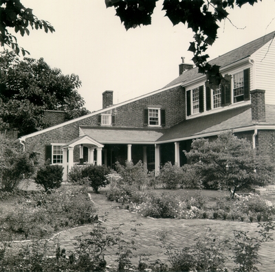 Photograph by the Lexington Herald-Leader of the garden and rear of the Ephraim McDowell House. 8x10