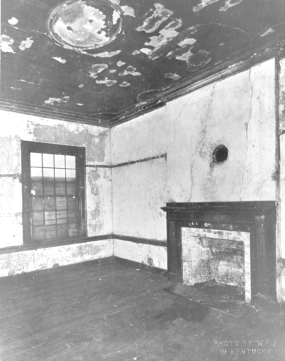 Interior view of the parlor of the Ephraim McDowell House prior to renovation by the WPA. Photos by the WPA with handwritten description on back of photo. 8x10