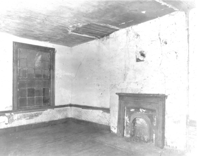 Interior view of the bedroom above the parlor of the Ephraim McDowell House prior to renovation by the WPA. Photos by the WPA with handwritten description on back of photo. 8x10