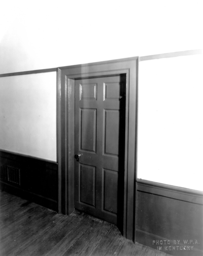 Interior view of the door to the living room of the Ephraim McDowell House after renovation by the WPA. Photos by the WPA with handwritten description on back of photo. 8x10