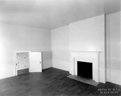 Interior view of the bedroom above the living room of the Ephraim McDowell House after renovation by the WPA. Photos by the WPA with handwritten description on back of photo. 8x10