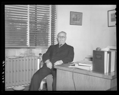 Deans & Professors (1940 Kentuckian) (University of                             Kentucky); man sitting next to a desk