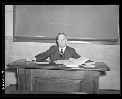 Deans & Professors (1940 Kentuckian) (University of                             Kentucky); man sitting at a desk