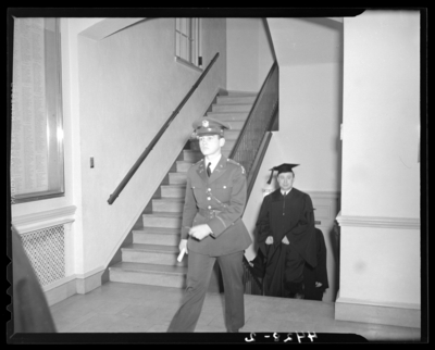 Commencement Exercises (1940 Kentuckian) (University of                             Kentucky); graduates walking up a staircase