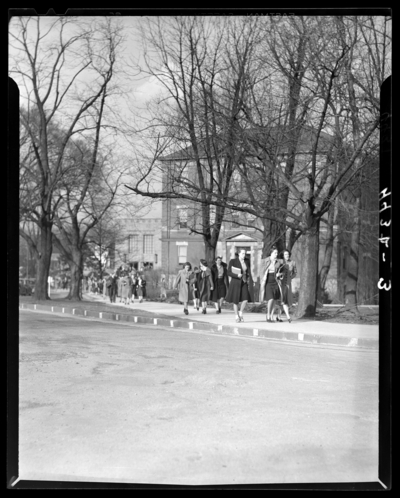 Campus Views (1940 Kentuckian) (University of Kentucky); students                             walking across campus