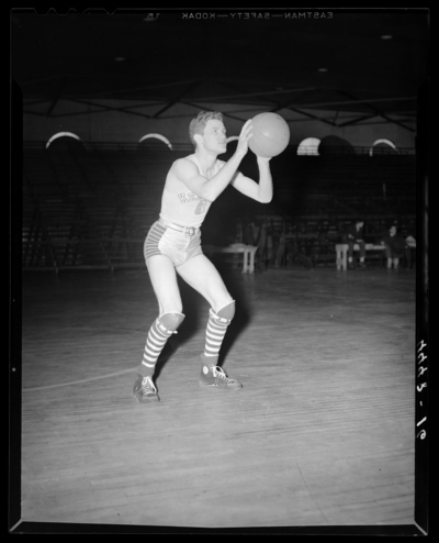 Varsity Basketball, (1940 Kentuckian) (University of Kentucky);                             interior, individual player on the court