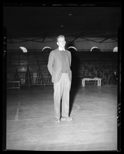 Varsity Basketball, (1940 Kentuckian) (University of Kentucky);                             interior, individual coach standing on the court