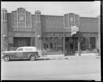 Goodwin Brothers, 444-450 East Main; building exterior, Goodwin                             Brothers delivery truck parked in front of store