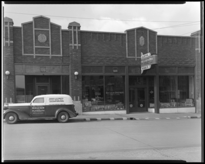 Goodwin Brothers, 444-450 East Main; building exterior, Goodwin                             Brothers delivery truck parked in front of store