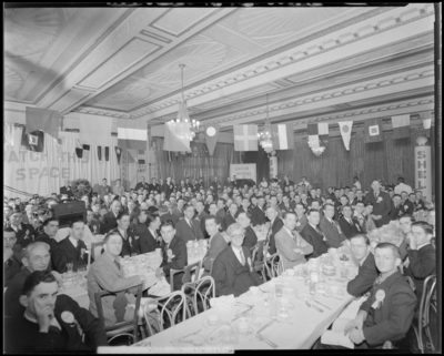 Shell Oil Company; Shell Oil conference; interior of banquet                             hall, large group sitting at banquet tables