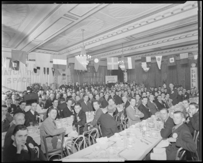 Shell Oil Company; Shell Oil conference; interior of banquet                             hall, large group sitting at banquet tables