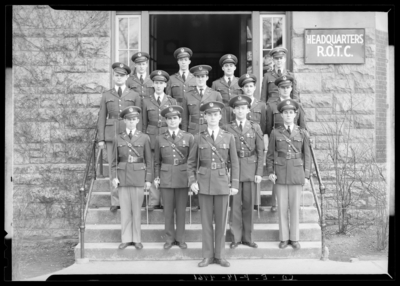 Company E (1940 Kentuckian) (University of Kentucky); Company E                             group members, group portrait in front of the R.O.T.C. Headquarters                             building