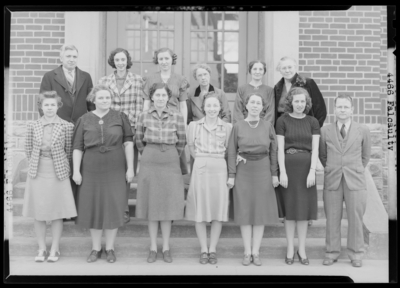 Faculty, North Middletown School; faculty group portrait in front                             of building