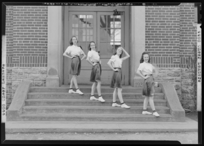 Cheerleaders, North Middletown School; cheer leading squad group                             portrait in front of building