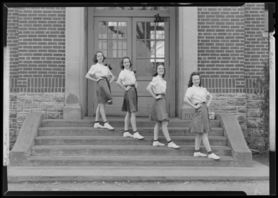 Cheerleaders, North Middletown School; cheer leading squad group                             portrait in front of building